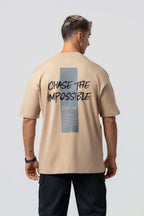 Oversize Backprint Interlock Tee - CHASE THE IMPOSSIBLE (BEIGE)
